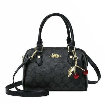 Mini Rowan Crossbody Bag In Signature Canvas